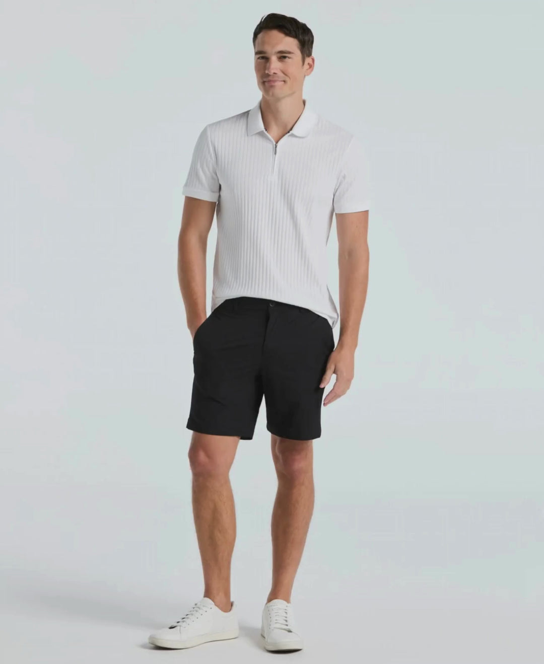 Video of a man wearing the black Perry Ellis Stretch Solid Tech Short