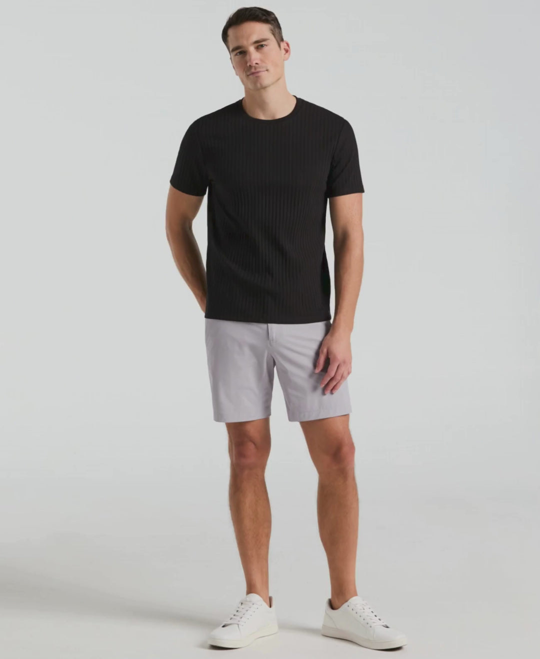Man wears Perry Ellis Ribbed Crew Neck Tee in color Black