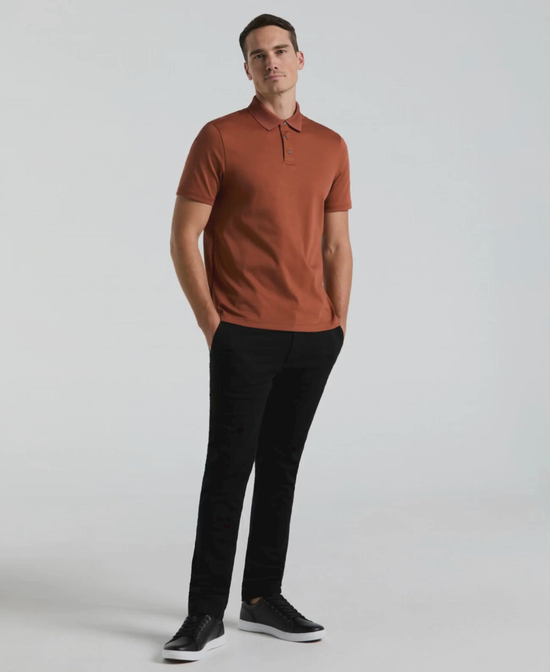 Video of a man wearing the perry Ellis Cool Interlock Polo in Rustic Brown